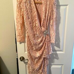 Elegant Lace Wrap Dress with Brooch